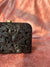 Carved wood clutch with delicate roses and leaves in black finish