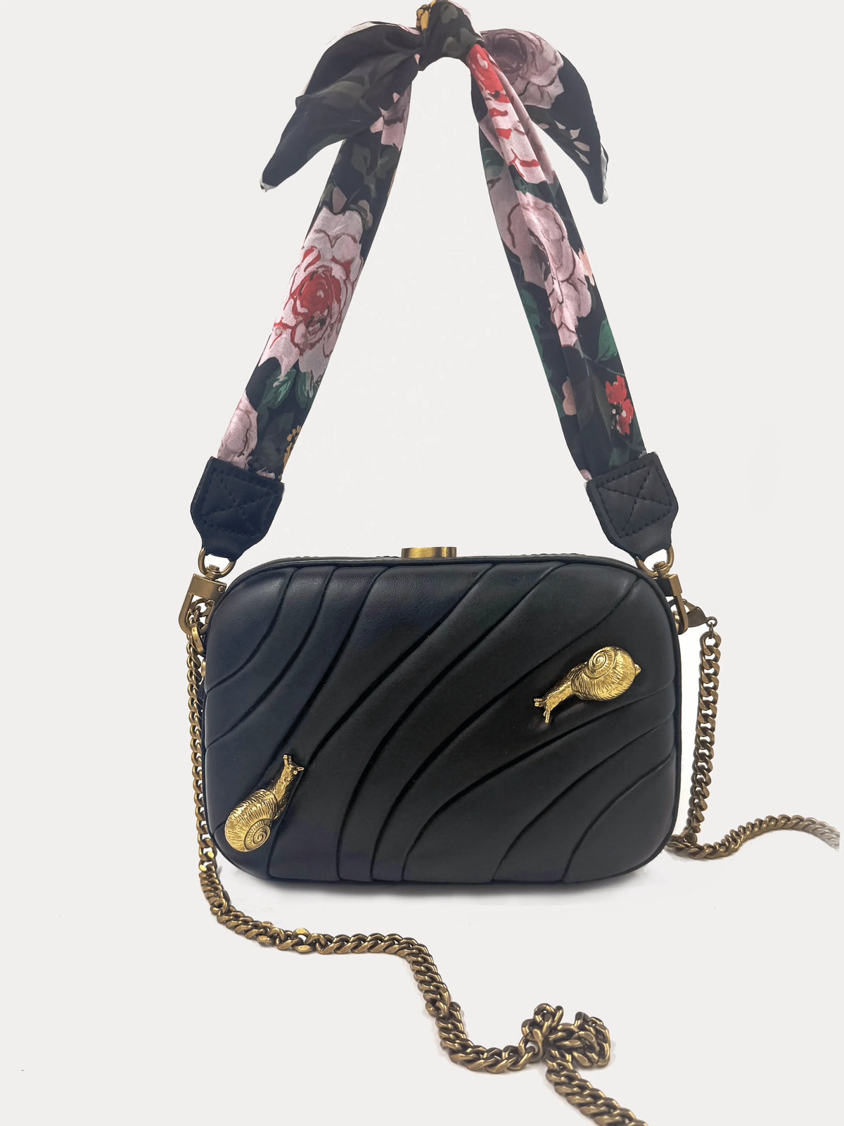 vegan leather puffed box clutch bag with brass snails